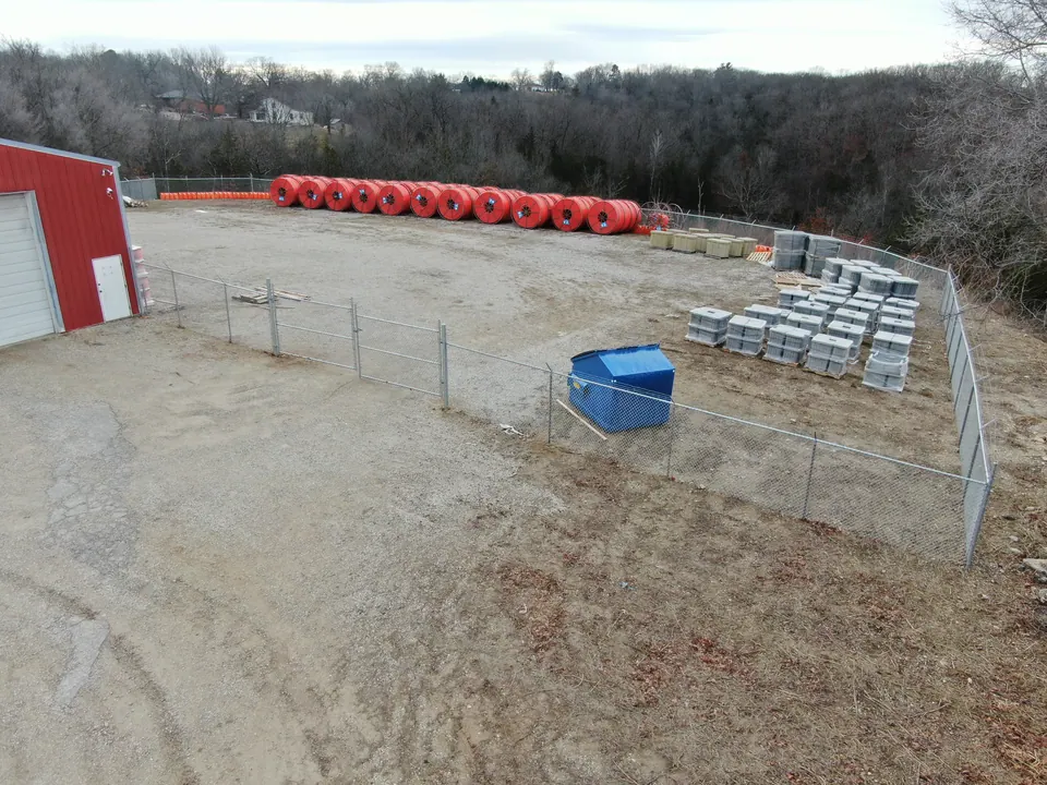 Chain link fence securing a commercial storage yard